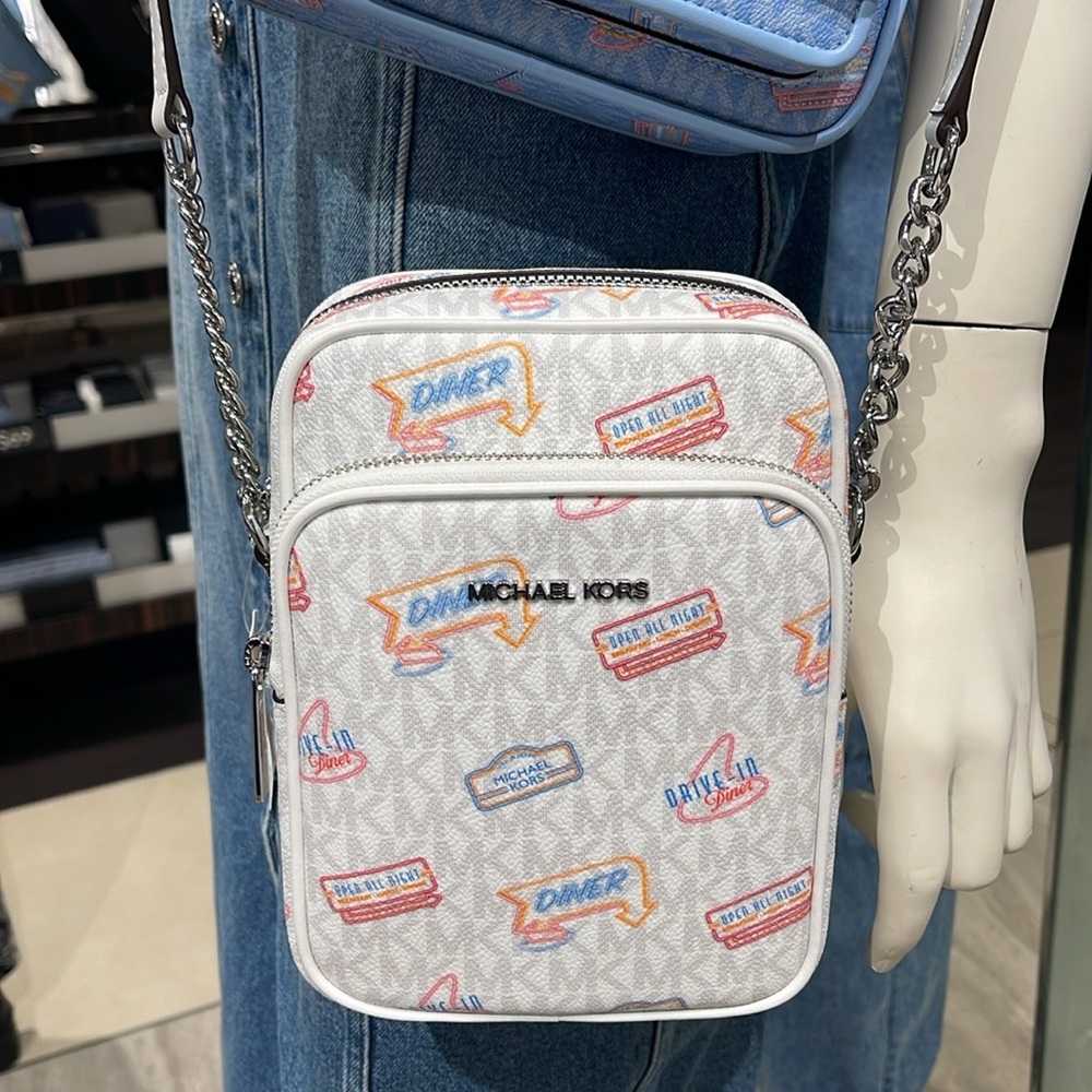 MICHAEL KORS
Jet Set Md Printed Signature Logo Crossbody NS CHAIN XBODY Flight - Picture 15 of 16